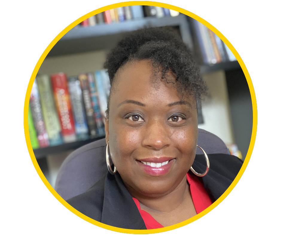 Sherrell, a young woman with dark skin, an updo, and gold hoops, smiles at work.