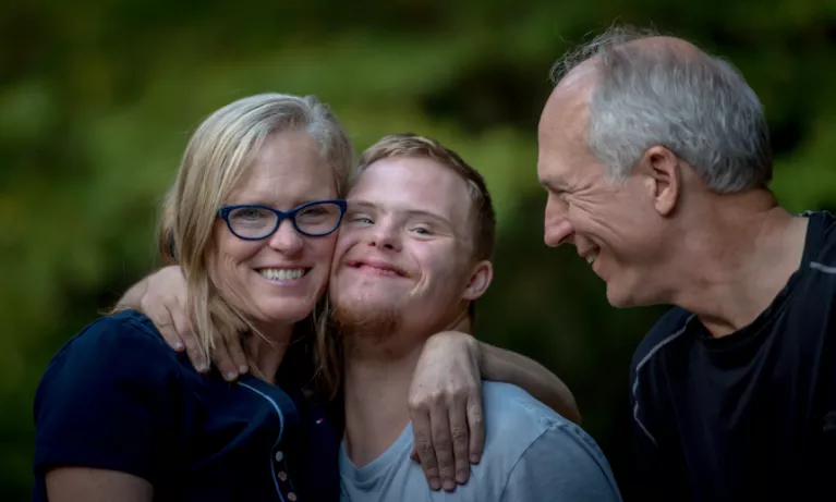 male student with idd supported by parents