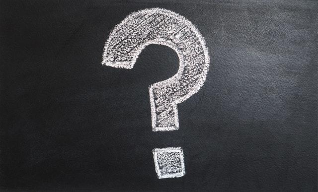 question mark written on a chalkboard
